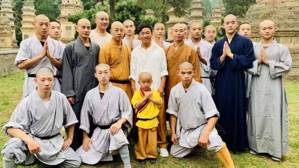 Image shows Maser Yanchen with his students at Shaolin Kung fu Wushu