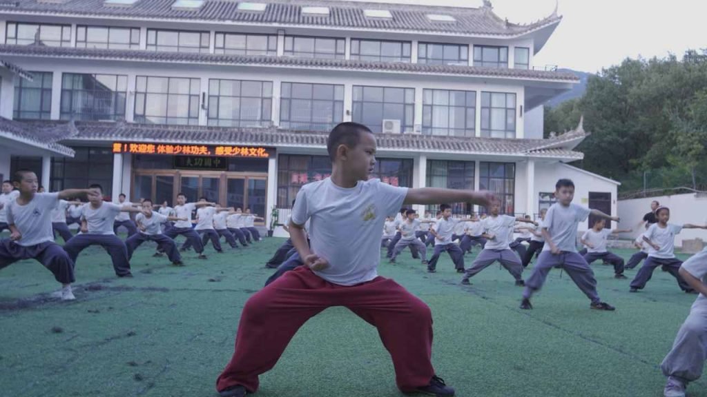 image shows kids doing Kung fu at Shaolin Kung fu Wushu