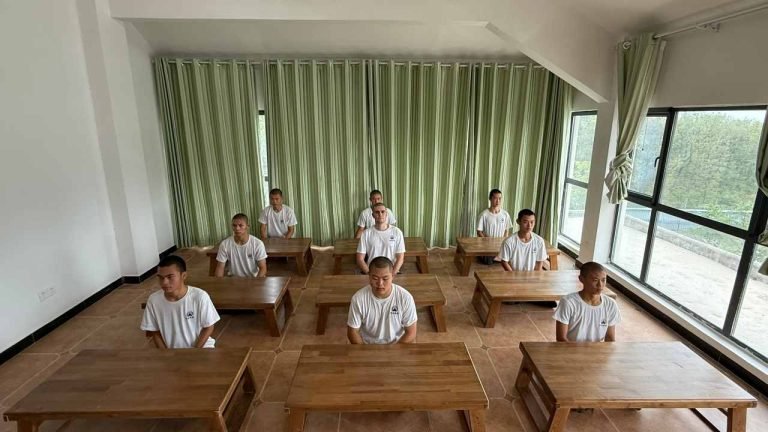 image shows students implementing Shaolin Qigong