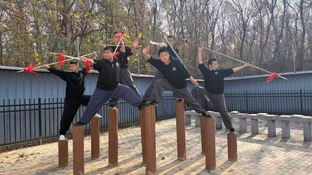 image shows students performing acorbatic acts