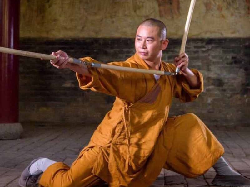 image shows shaolin kung fu master yan chen